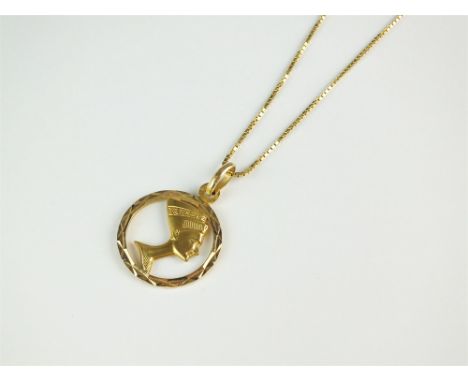 A yellow metal pendant depicting Nefertiti, the lug stamped '750', with yellow metal chain, total weight approx 6.7g