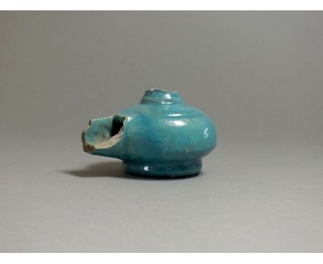 Byzantine, ceramic glazed oil lamp, 9th - 10th century AD. Long wide nozzle, oval body with sloping shoulder with impressed l