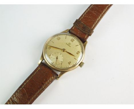 A Gentleman's 9ct gold Omega wristwatch, the silvered dial with Arabic numerals, batons and subsidiary seconds dial, manual w
