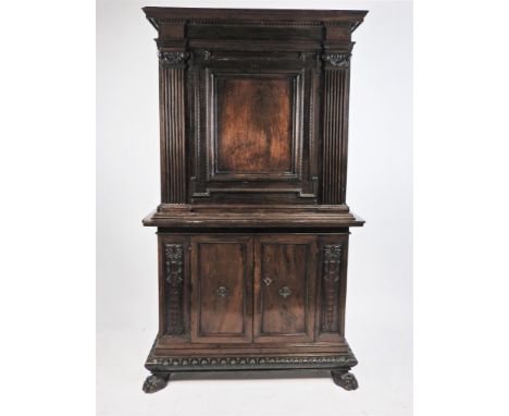 A north Italian walnut secretaire a abattant 17 th /18 th century and later, the dentil moulded cornice above an indented dro