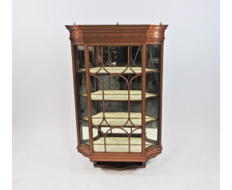 An Edwardian painted satinwood wall hanging display cabinet, the stepped cornice above a foliate painted frieze and ribbed gl