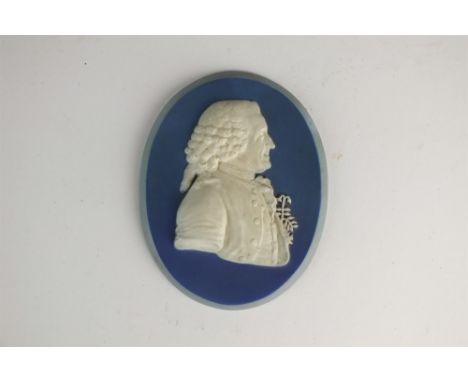 A Wedgwood and Bentley blue and white jasper portrait medallion of Carolus Linnaeus circa 1775-80, modelled by John Flaxman, 