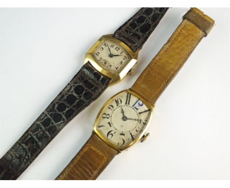 A Lady's yellow metal wristwatch, the oblong silvered dial with Arabic numerals and subsidiary seconds dial, manual wind, wit