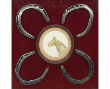 FOUR HORSESHOES BELONGING TO THE 1896 DERBY WINNER PERSIMMONThe four shoes surmounting an oval photograph of Persimmon to the