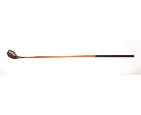 CHARLES LEVEN: A PATENT (APPLIED FOR) PRACTICE DRIVER, CIRCA 1920Featuring a wooden head fitted with interior weight and meas