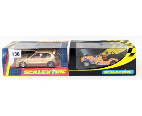 Scalextric, C2231- 'Caterham 7 Comma' model slot car, with limited edition 405/1000- C2130- 'Toyota Corolla (Gold)' model, al