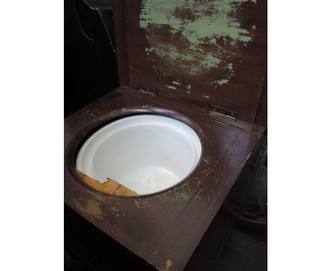 A late 19th/early 20th Century stained frame commode