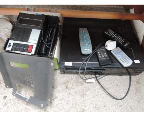 A vintage cassette recorder, projector, video etc