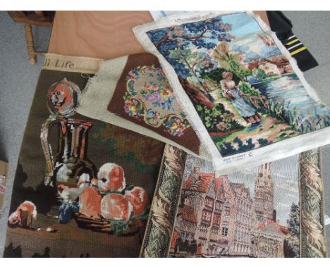 A collection of tapestry wall hangings