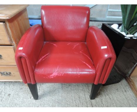 A vintage style red leatherette chair