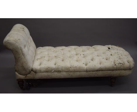 A Victorian button upholstered chaise lounge. Approximately 165 cm long.