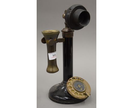 A vintage candlestick telephone. 29 cm high.