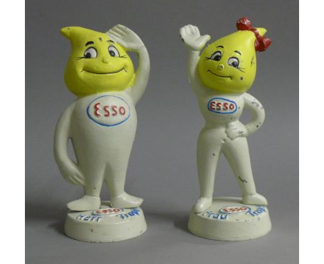 A pair of Esso cast iron money boxes. The largest 23.5 cm high.