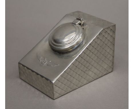 A Bentley inkwell. 6 cm high.