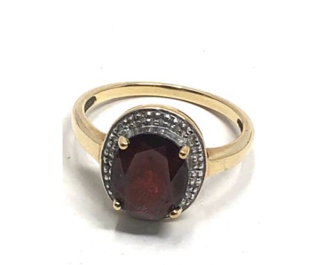 9ct gold garnet &amp; diamond halo dress ring (2.7g) 