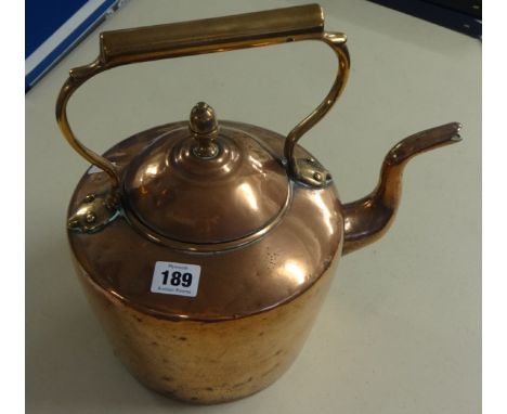 A Victoria copper kettle, force brass, 2 salters Economical brass scales, copper flask, together with a copper and turned woo