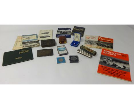 A small collection including car manuals and pamphlets including Morris Miner, Jaguar XJ12, Thraxton racing, also a First Wor