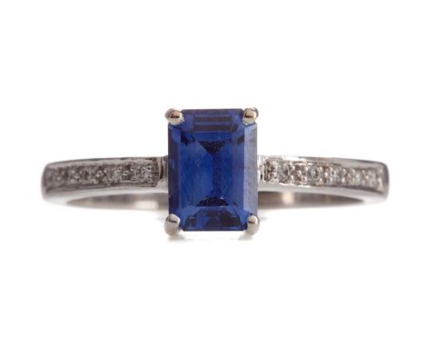 SAPPHIRE AND DIAMOND RING,the emerald cut sapphire of approximately 1.53 carats, on diamond shoulders, the round brilliant cu