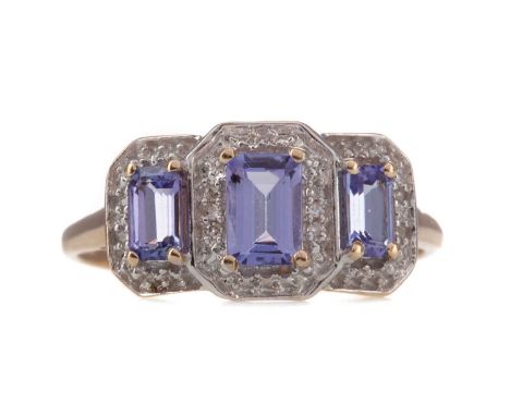 TANZANITE AND DIAMOND RING,set with emerald cut tanzanites within an illusion set diamond border, in nine carat gold, size S,