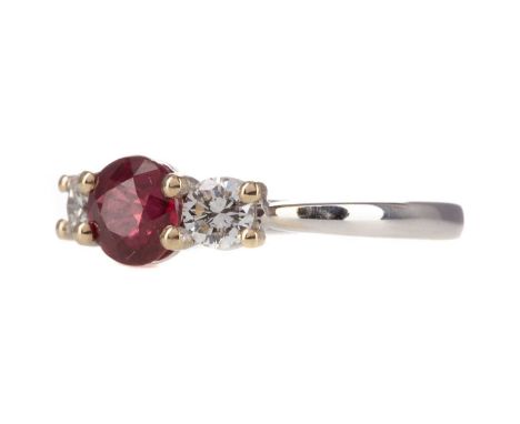 RUBY AND DIAMOND RING,the round ruby of approximately 1.00 carat, flanked by round brilliant cut diamonds totalling approxima