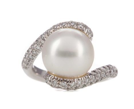 SOUTH SEA PEARL AND DIAMOND RING,the pearl 11.8mm in diameter, with crossover diamond set shoulders, in eighteen carat white 