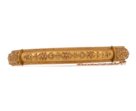 GOLD ETRUSCAN REVIVAL BANGLE,with beadwork decoration to the front panel, in nine carat gold, 9.7gCondition report: Generally