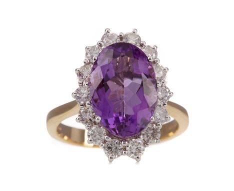 AMETHYST AND DIAMOND RING,the oval amethyst of approximately 3.00 carats, within a halo of round brilliant cut diamonds total