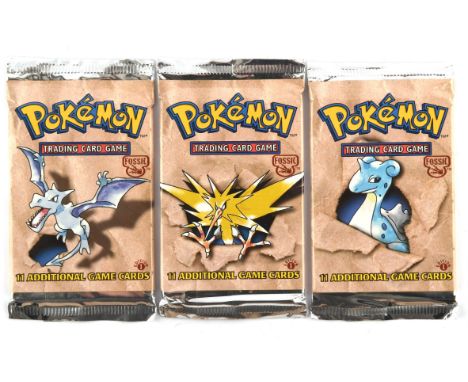 Pokemon TCG. Complete art set of Pokemon Fossil 1st edition sealed Booster Packs including Lapras (21.0g), Aerodactyl (21.1) 
