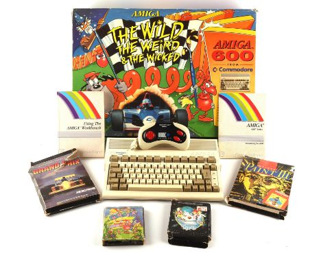 Commodore Amiga 600 Home Computer - The Wild, The Weird and The Wicked Box Includes: Push-Over, Grand Prix, Deluxe Paint III,