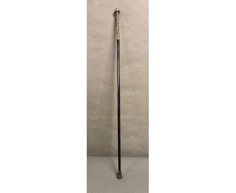 A chinese silver topped cane with bamboo leaf releif