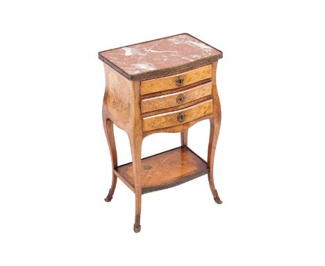 A French Louis XV style marble-topped kingwood, tulipwood and marquetry Pettit bombe commode, late 19th century, with a brass