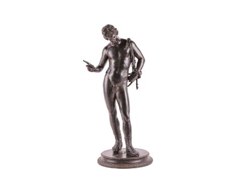 After the Antique, a grand tour patinated bronze figure of Narcissus, signed by the Foundry Sommer, on a circular base, 62 cm
