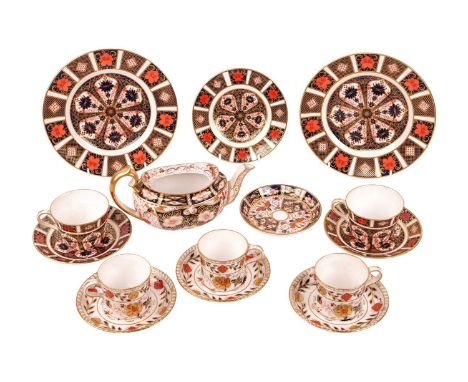A collection of Royal Crown Derby part tea service, comprising a teapot without cover, three coffee cups, three saucers, a pa