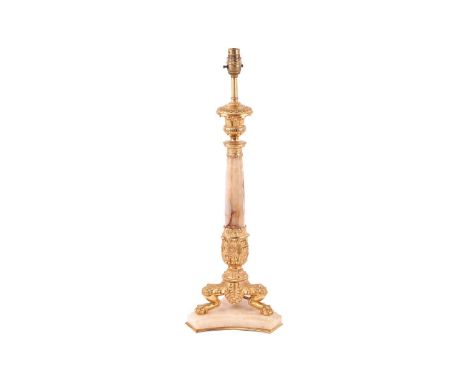 A Louis Phillipe style large and impressive onyx column table lamp and gilt metal table lamp, mid-20th century, on heavy cast