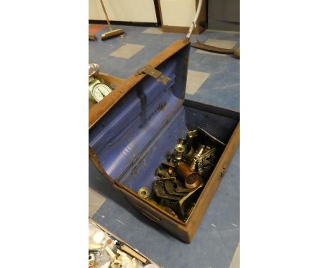 A Tin Trunk Containing Brass and Copper Items to Include Kettle Stand, Candle Sticks, Letter Rack, Jug Etc 