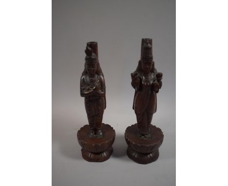 A Pair of Carved Oriental Figures Depicting God and Goddess on Lotus Plinths with Incense Stick Recesses, 32cm High