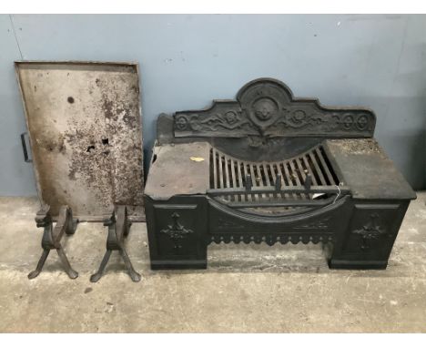 A Victorian cast iron fire grate, width 82cm, depth 36cm, height 51cm, with ash pan and a pair of wrought iron fire dogs. Con