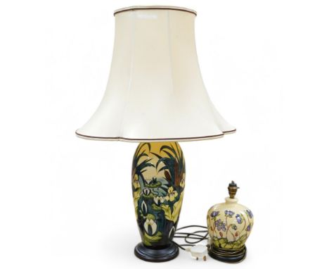 A large Moorcroft Lamia patterned table lamp base and a small Hepatica patterned table lamp base. Largest lamp base 40cm high