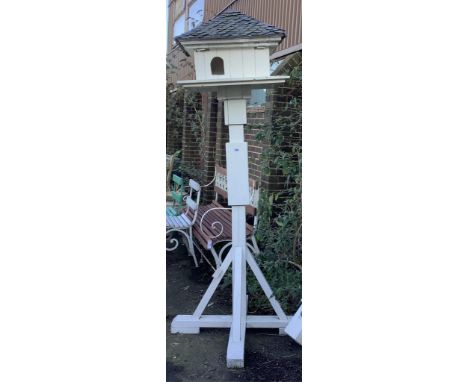 A painted garden dovecote with copper scale roof, height approximately 220cm. Condition - fair
