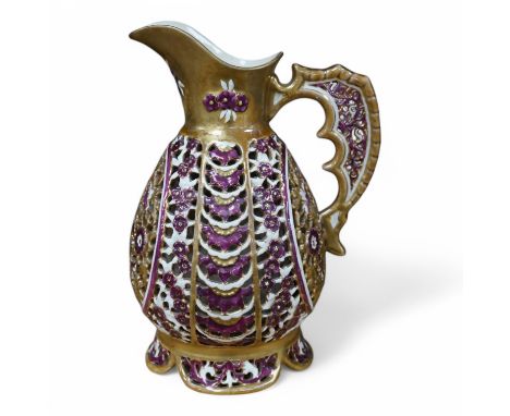 A Zsolnay Pecs double walled jug, 26cm. Condition- expertly restored