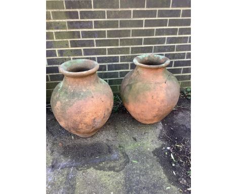 Two pairs of terracotta planters, larger height 58cm. Condition - fair, one baluster planter badly cracked