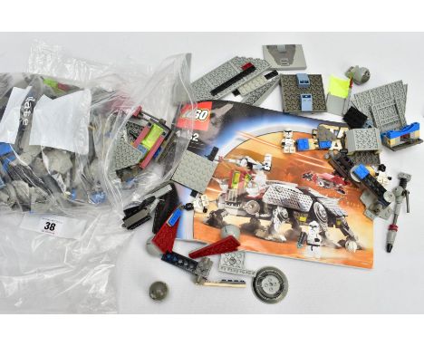 AN UNBOXED LEGO STAR WARS AT TE 4482, in used condition, missing some of the Mini Figures but with instruction manual, comple