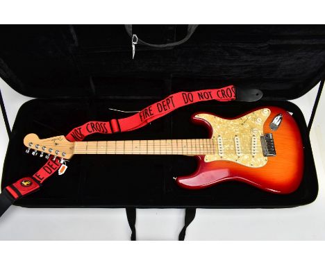 A 2004 FENDER STRATOCASTER DELUXE, manufactured at the Corona, Caliafornia, USA factory, Serial No DZ4256116, one piece maple