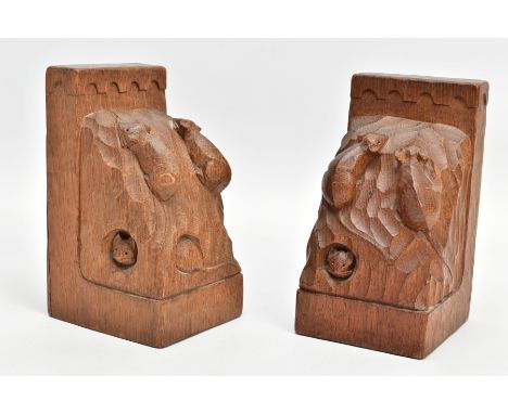 A PAIR OF ROBERT' MOUSEMAN' THOMPSON OAK TRIPLE MOUSE BOOKENDS, each end carved with three mice beneath half penny moulding, 