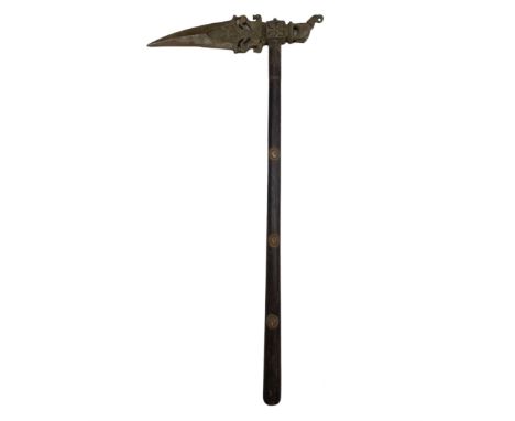 19th century Indian axe with reinforced blade and three animals with elephant at the rear, the wooden haft with applied oval 