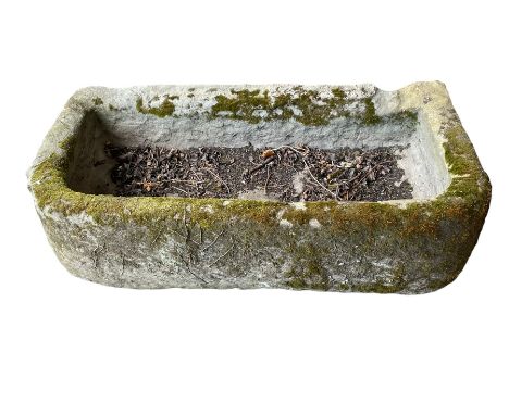 19th century tooled and weathered stone trough or planter, D-shaped form with shallow hewn centreDimensions: Height:&nbsp;29c