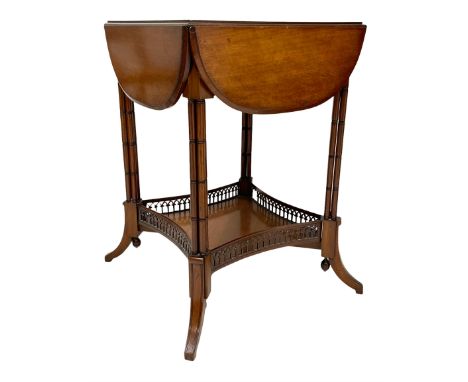 Jas Shoolbred &amp; Co. - late Victorian walnut centre table, moulded top with four drop leaves, on turned cluster column pil