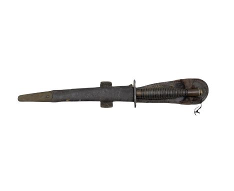Commando knife by William Rodgers, Sheffield with double sided blade and ring grip, the leather scabbard marked with Ordnance