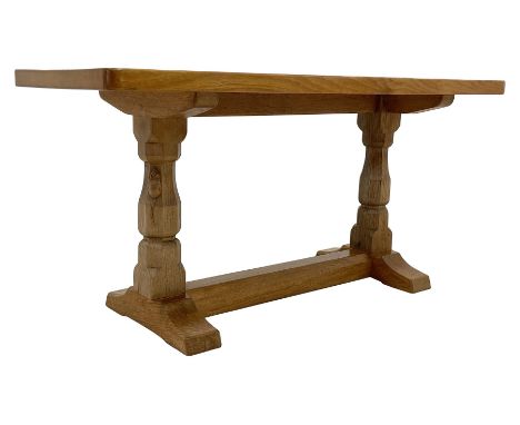 'Mouseman' oak coffee table, rectangular adzed top on octagonal supports, one carved with mouse signature, sledge feet joined