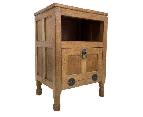 'Oakleafman' adzed oak bedside or lamp table, rectangular top over shelf and double panelled fall front, panelled sides carve